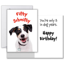 Load image into Gallery viewer, 50th Birthday greeting card with a Jack Russell terrier on the front, bold red text &#39;Fifty Schmifty&#39;, inside message &#39;You&#39;re only 8 in dog years. Happy Birthday!&#39;, comes with a white envelope.
