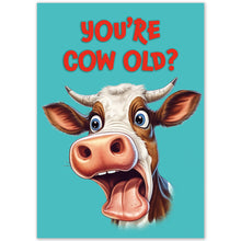 Load image into Gallery viewer, Close-up of the front of the &quot;You&#39;re Cow Old?&quot; birthday card with red text and a cartoon cow.
