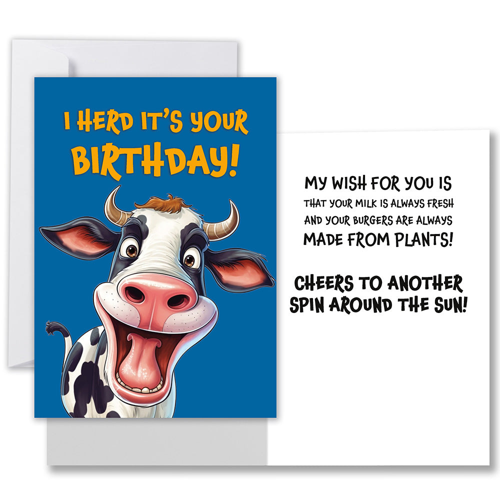 Front of the blue greeting card with a smiling cow and 